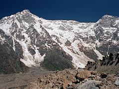 
We walked a little farther from Herligkoffer Base Camp (3656m) onto the Bazhin Glacier with the Nanga Parbat Rupal Face and the ridge to Rakhiot Peak towering above. Gunther Messner letter home June 15, 1970: To the north, directly above us, is the Rupal Flank � 4500m to the summit. It is unbelievably impressive. (The Naked Mountain by Reinhold Messner)
